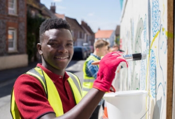 boy painting wall